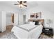 Spacious bedroom with modern decor and a walk-in closet with cedar siding at 408 E 1St Ave, Denver, CO 80203