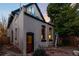 View of house showcasing back entrance and exterior detailing at 408 E 1St Ave, Denver, CO 80203