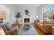 Inviting living room with hardwood floors and a fireplace at 408 E 1St Ave, Denver, CO 80203