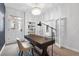 Bright home office with custom built-ins, a modern desk and front-door access at 408 E 1St Ave, Denver, CO 80203