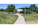 Community playground with shaded play structures at 4841 S Picadilly Ct, Aurora, CO 80015