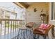 Relaxing covered patio with seating, a bird house, and views of the community at 4070 S Atchison Way # 203, Aurora, CO 80014