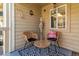 Cozy patio space with comfortable seating, perfect for relaxation and outdoor enjoyment at 4070 S Atchison Way # 203, Aurora, CO 80014