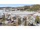 Scenic aerial view of homes nestled near a snow-dusted mountain range, offering a tranquil environment at 57 Audrey Cir, Breckenridge, CO 80424