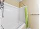 Clean bathroom featuring a white tiled shower/tub combo with neutral colored walls at 57 Audrey Cir, Breckenridge, CO 80424