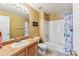 Bathroom features a bathtub/shower combo and vanity with sink at 57 Audrey Cir, Breckenridge, CO 80424