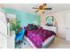 Bedroom offers a ceiling fan, desk, and a serene blue accent wall at 57 Audrey Cir, Breckenridge, CO 80424