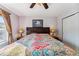 Bedroom featuring a ceiling fan, side tables, and closet at 57 Audrey Cir, Breckenridge, CO 80424
