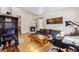 Inviting living room featuring a fireplace and views into the kitchen at 57 Audrey Cir, Breckenridge, CO 80424