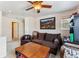 Cozy living room with carpet, comfortable seating, and a nice view through the window at 57 Audrey Cir, Breckenridge, CO 80424