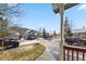 Picturesque neighborhood view from the front porch with mature trees and well-maintained homes at 57 Audrey Cir, Breckenridge, CO 80424