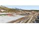 Panoramic view of a town, including a school, fields, and mountains, showing the community's amenities at 57 Audrey Cir, Breckenridge, CO 80424