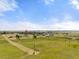 Aerial perspective of the property and its surroundings, highlighting its location in a vast, open landscape at 1788 Shoshone Trl, Elizabeth, CO 80107