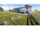 Backyard view showcasing a deck, patio, and fenced yard, perfect for relaxation and outdoor entertaining at 1788 Shoshone Trl, Elizabeth, CO 80107