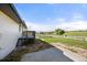A backyard view reveals a white-fenced area and outbuilding, with a lush landscape backdrop at 1788 Shoshone Trl, Elizabeth, CO 80107