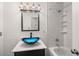 Bathroom featuring a unique vessel sink, shower and modern fixtures at 1788 Shoshone Trl, Elizabeth, CO 80107