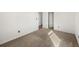 A carpeted bedroom with natural light at 1788 Shoshone Trl, Elizabeth, CO 80107