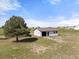 Exterior view of the outbuilding on a property, featuring durable siding and practical design at 1788 Shoshone Trl, Elizabeth, CO 80107