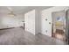 Open floor plan with stainless steel appliances, gray cabinets, and a fireplace at 1788 Shoshone Trl, Elizabeth, CO 80107