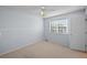 Bedroom featuring a ceiling fan, window with blinds, and neutral carpet at 19118 E Grand Cir, Aurora, CO 80015