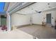 Large garage with automatic door openers, lighting, and additional space for storage at 19118 E Grand Cir, Aurora, CO 80015