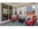 Covered patio with comfortable seating and a fire pit, great for outdoor gatherings at 6174 Flattop St, Golden, CO 80403