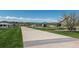 Wide view of the community with a historical landmark path and mountain views, showcasing a vibrant and welcoming neighborhood at 625 S Xenon Ct, Lakewood, CO 80228
