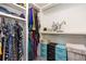 Spacious walk-in closet with ample shelving and hanging space at 5480 Danube St, Denver, CO 80249