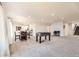 Bright basement space with foosball table, a dining table, and a treadmill providing entertainment and fitness options at 21855 E Idyllwilde Dr, Parker, CO 80138