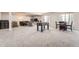 Large basement area with plush carpeting, a foosball table, and comfortable seating with lots of space at 21855 E Idyllwilde Dr, Parker, CO 80138