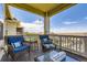 Relaxing covered deck with neighborhood views and ample space for outdoor living at 21855 E Idyllwilde Dr, Parker, CO 80138
