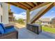 Covered patio with outdoor storage and access to a well-maintained backyard at 21855 E Idyllwilde Dr, Parker, CO 80138