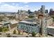 Expansive city view featuring modern condo building with Denver Art Museum and downtown skyline at 55 W 12Th Ave # 608, Denver, CO 80204