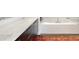 Contemporary bathroom with a large vanity, dual sinks, and modern tub at 55 W 12Th Ave # 608, Denver, CO 80204
