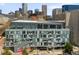 Contemporary condo building showcasing modern architectural design with many windows and street access at 55 W 12Th Ave # 608, Denver, CO 80204