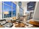 Bright living room with floor-to-ceiling windows, hardwood floors, comfortable seating, and modern decor, offering great city views at 55 W 12Th Ave # 608, Denver, CO 80204