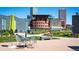 Outdoor seating area features modern design and city views at 55 W 12Th Ave # 608, Denver, CO 80204