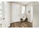 Inviting foyer with front door, bench seating, and ample natural light at 6041 N Orleans, Aurora, CO 80019