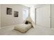 bedroom showcasing a fun teepee, neutral walls with nice artwork, and a comfortable carpeted floor at 6041 N Orleans St, Aurora, CO 80019