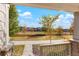Inviting front porch view of the community park and walking path, showcasing a peaceful and picturesque neighborhood setting at 6041 N Orleans St, Aurora, CO 80019