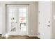 Welcoming entryway with light-filled view into the adjacent office at 6041 N Orleans St, Aurora, CO 80019