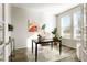 Well-lit office with a modern desk setup, stylish decor, and ample natural light at 6041 N Orleans St, Aurora, CO 80019