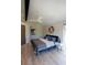 Comfortable bedroom with a ceiling fan, closet, and natural light at 1175 S Jackson St, Denver, CO 80210