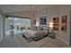 Bright bedroom featuring vaulted ceilings, modern lighting, and stylish decor at 1175 S Jackson St, Denver, CO 80210