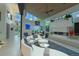 Bright, open living room featuring large windows, a modern fireplace, and a comfortable, curved white sofa at 1175 S Jackson St, Denver, CO 80210