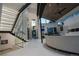 Bright living room featuring modern stairs, high ceilings, and elegant decor at 1175 S Jackson St, Denver, CO 80210