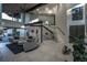Bright living room with high ceilings, modern staircase, and luxury finishes throughout the home at 1175 S Jackson St, Denver, CO 80210