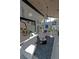 Expansive living room featuring high ceilings, glass stairwell, and modern decor at 1175 S Jackson St, Denver, CO 80210