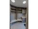 Well-organized mudroom area with custom built-ins, shelving, hooks, and bench seating at 1175 S Jackson St, Denver, CO 80210