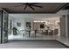 Open concept living with a seamless flow from the dining room to the modern kitchen at 1175 S Jackson St, Denver, CO 80210